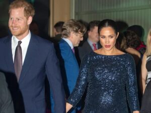 Prince Harry says he woke up to Meghan Markle crying into her pillow over a 'smear campaign' against her