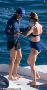 Harry Styles, 27, and girlfriend Olivia Wilde, 37, passionately kiss while enjoying a romantic day onboard a yacht in Tuscany