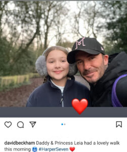 David Beckham defies critics as he kisses his daughter on the mouth