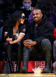 Kanye West all smiles as he sits courtside with his new girlfriend Chaney Jones at the Lakers after ex Kim Kardashian made her relationship with Pete Davidson Instagram official (photos)