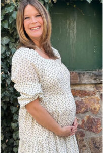 Mother-of-eight, 50, is pregnant with her grandchild after becoming a surrogate for her daughter, 24, who can't conceive