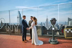 A Ukrainian couple married on top of an NYC skyscraper, then 3 hours later flew to Italy for a wedding with their families who fled the war