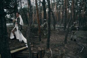 Russia-Ukraine War: Popular Ukrainian Sniper Gets Married On The Frontline To A Soldier While Wielding Machine Gun (Photos)