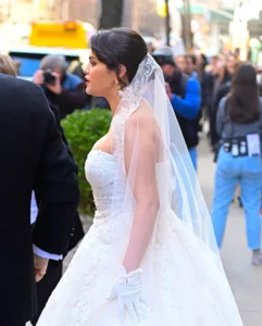Selena Gomez spotted in wedding dress enjoying 'a regular day at work' after sharing relationship status